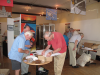 Members of the Friends at work on one of their past projects, constructing the special display for the centenary of WW1.